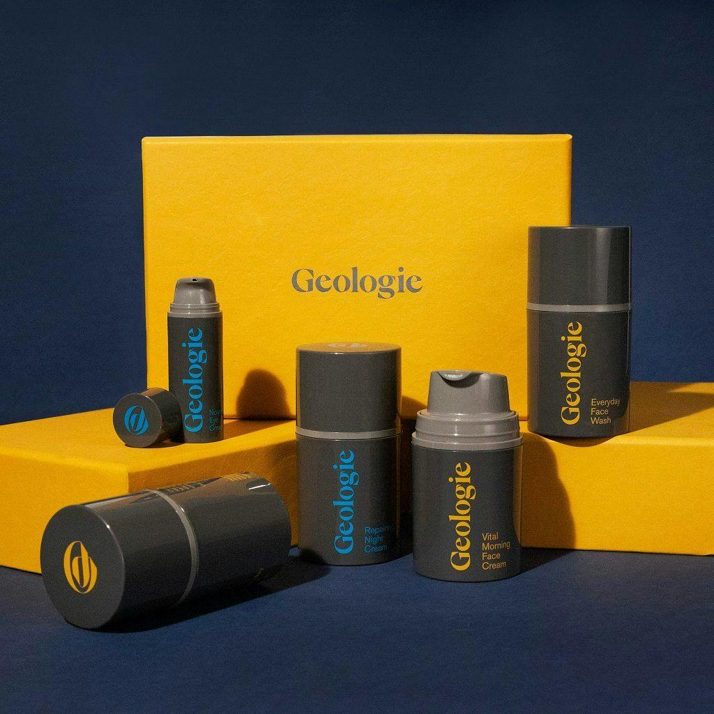 Range of Geologie beauty products placed on yellow packaging